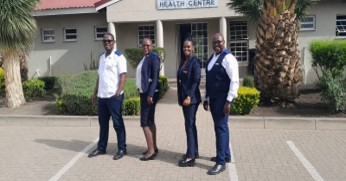 Villa Maria Health Centre team outside the facility